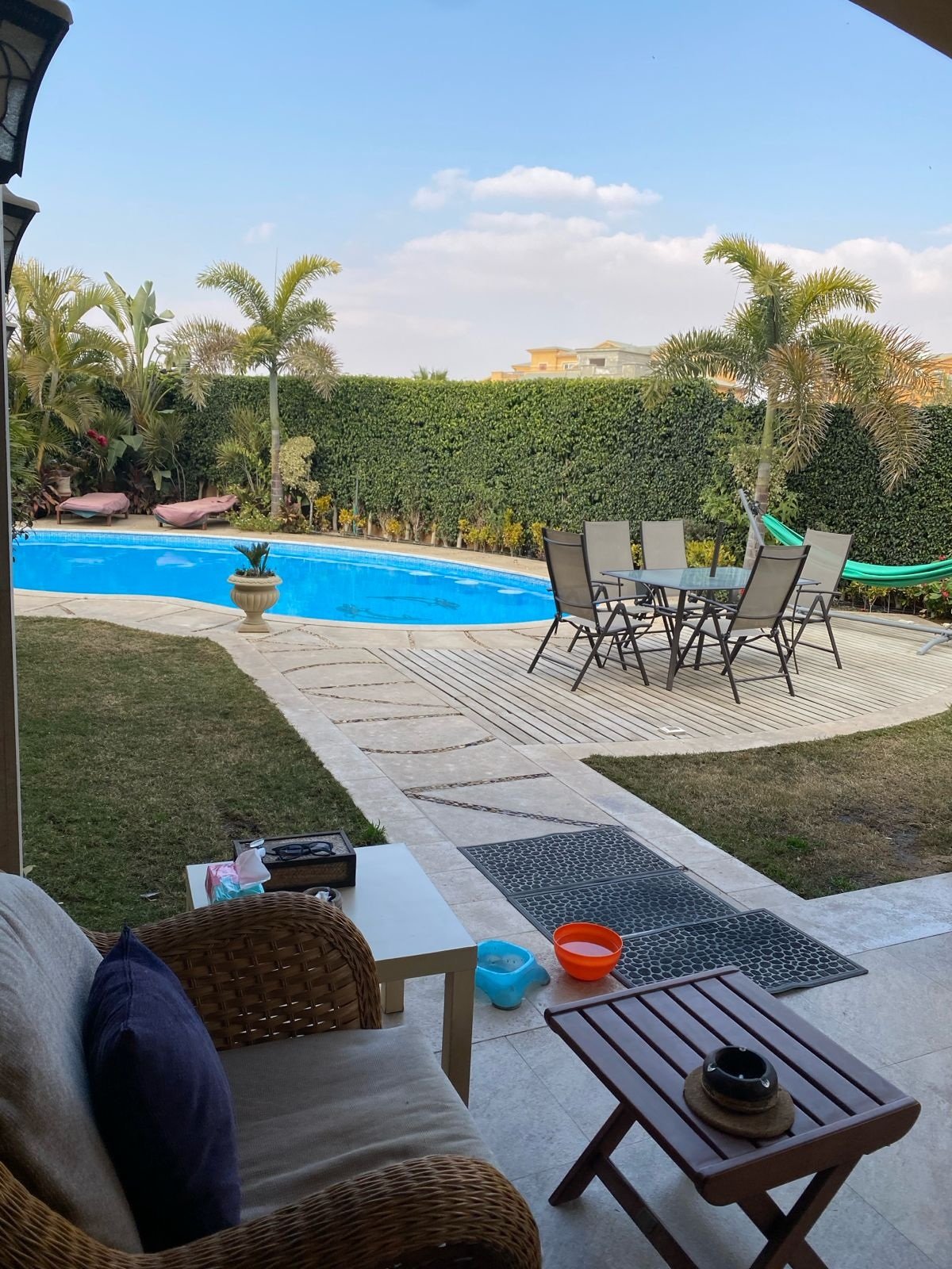 Garden seating beside pool, Deyar twin house for sale | جلسة الحديقة بجوار حمام السباحة، توين هاوس للبيع في ديار
