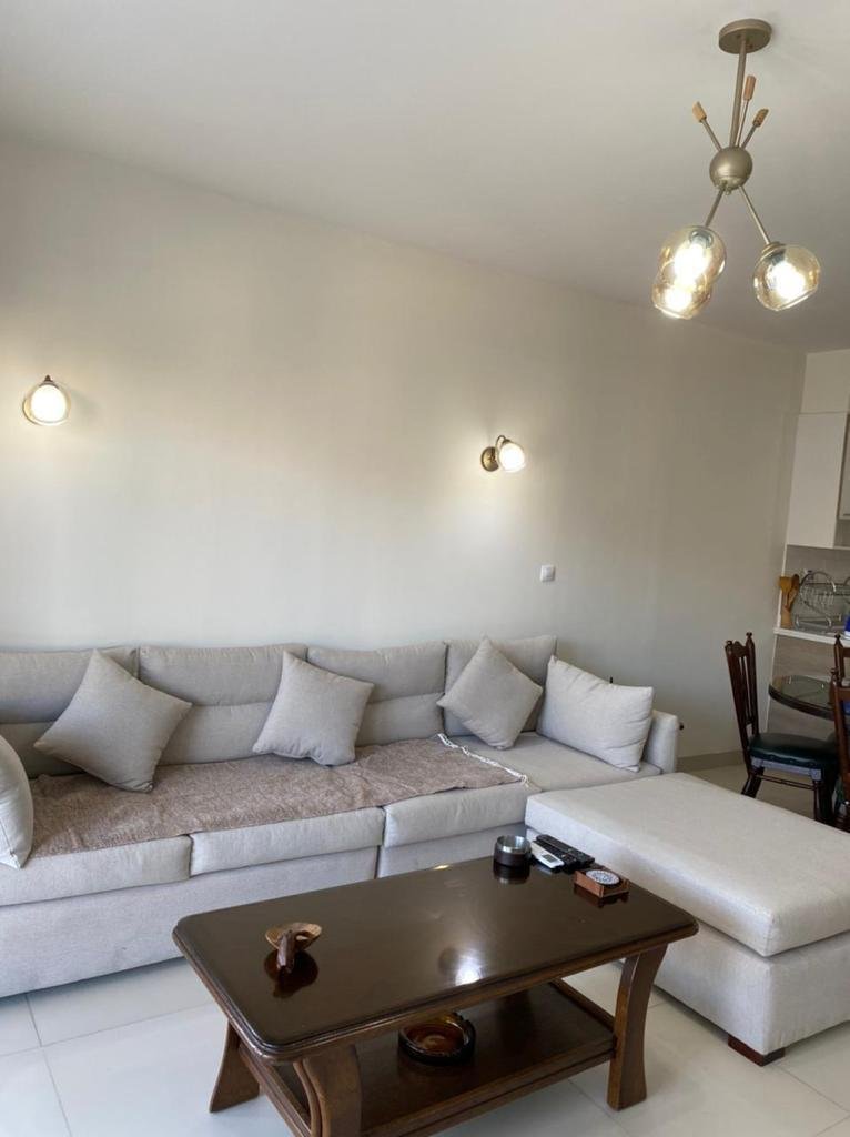 Furnished reception with sofa, chalet for rent in Marassi Marina 2, North Coast | ريسيبشن مفروش بكنبة، شاليه للإيجار في مراسي مارينا 2، الساحل الشمالي