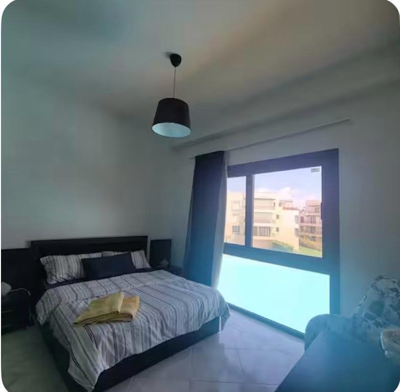 Bedroom with a double bed, chalet for rent in Marassi Blanca, North Coast | غرفة نوم بسرير مزدوج، شاليه للإيجار في مراسي بلانكا، الساحل الشمالي