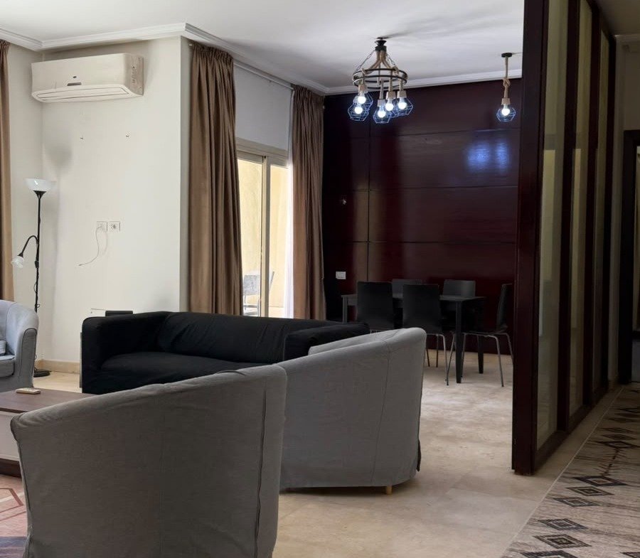 Reception and kitchen area, The Village garden apartment for sale | منطقة الريسيبشن والمطبخ، شقة بحديقة للبيع في ذا فيلدج