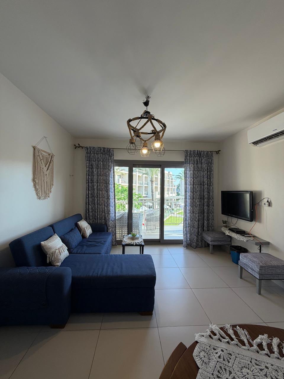 48-marassi-marina-2-304-01 Furnished reception with terrace access, chalet for rent in Marassi Marina 2, North Coast | ريسيبشن مفروش متصل بالتراس، شاليه للإيجار في مراسي مارينا 2، الساحل الشمالي