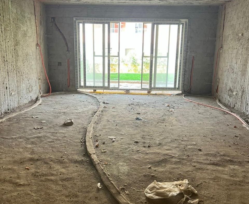 Unfinished reception with garden-facing window in Promenade, Fifth Settlement, New Cairo, apartment for sale | ريسيبشن بدون تشطيب بشباك على الحديقة في برومناد التجمع الخامس، شقة للبيع