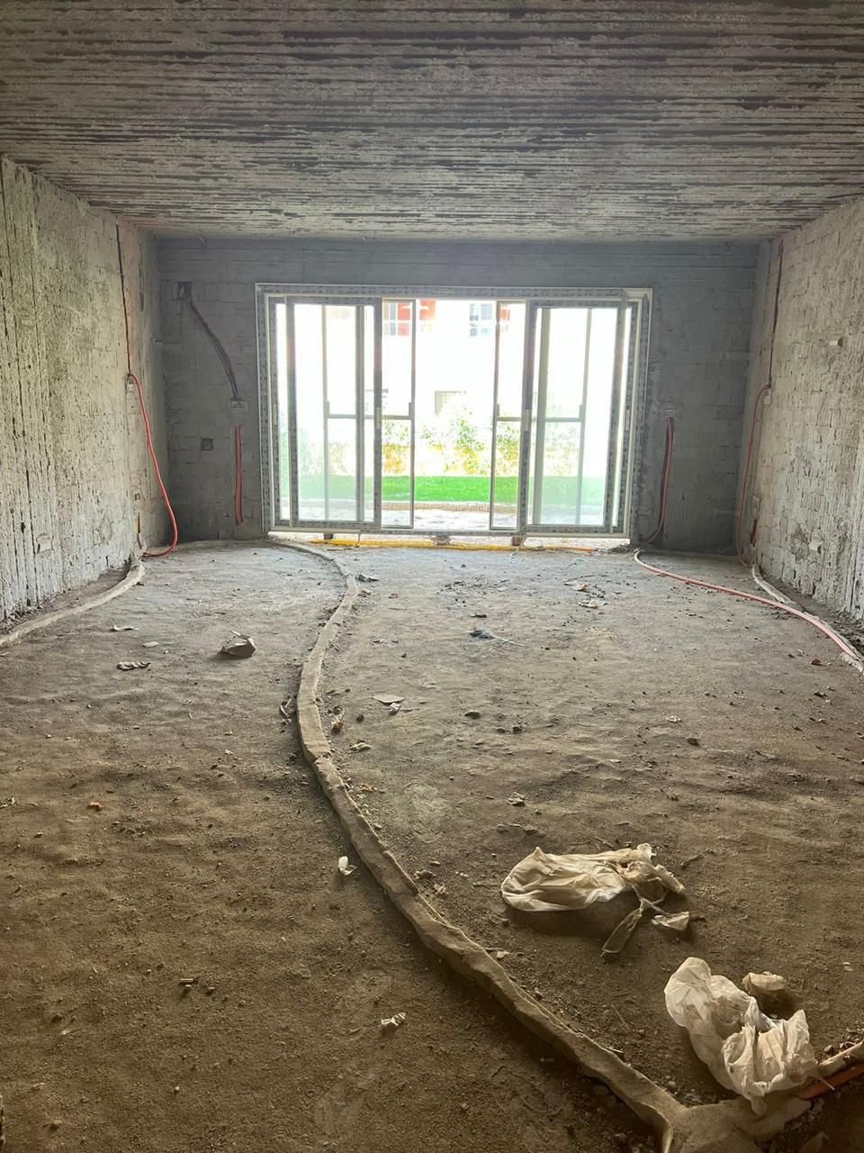 Unfinished reception with garden-facing window in Promenade, Fifth Settlement, New Cairo, apartment for sale | ريسيبشن بدون تشطيب بشباك على الحديقة في برومناد التجمع الخامس، شقة للبيع