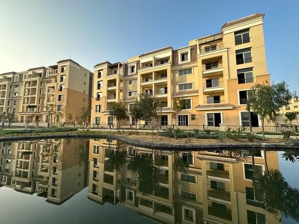 Sarai apartment buildings beside a water feature | عمارات سراي بجوار المسطح المائي