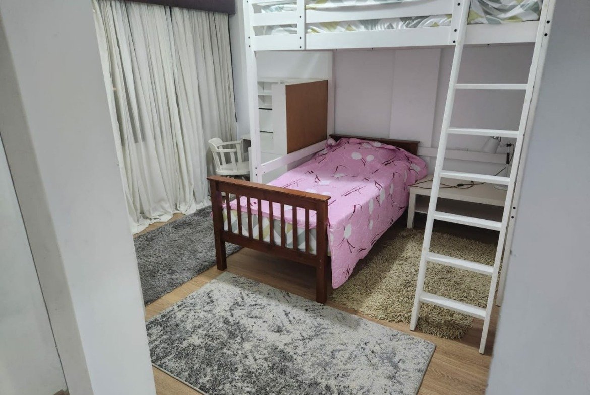 Bedroom with bunk loft and pink bedding - apartment in Golden Square, Fifth Square, New Cairo