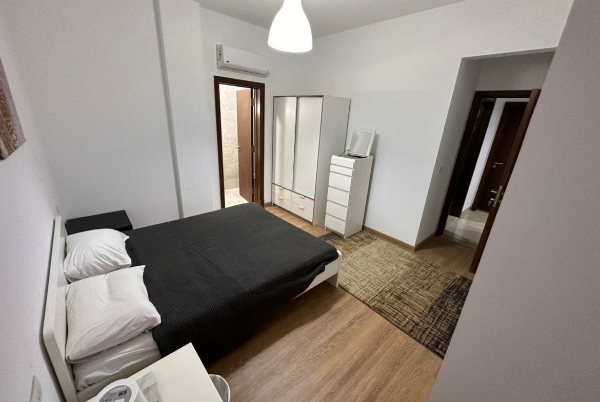 Bedroom with black bedding - apartment in Golden Square, Fifth Square, New Cairo