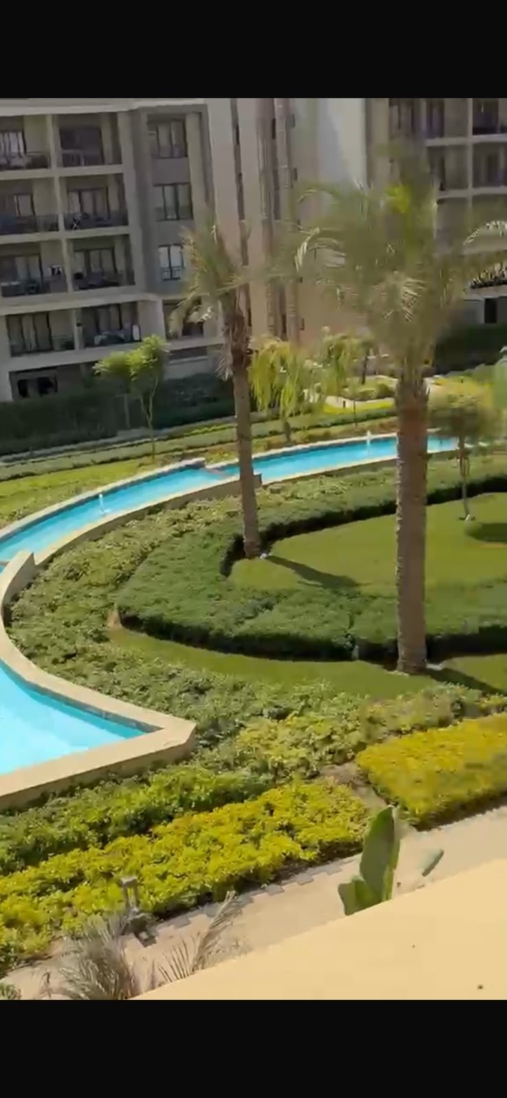 5th-square-apartment-for-rent-461-03 Water channel and gardens seen from above - apartment in Fifth Square, New Cairo