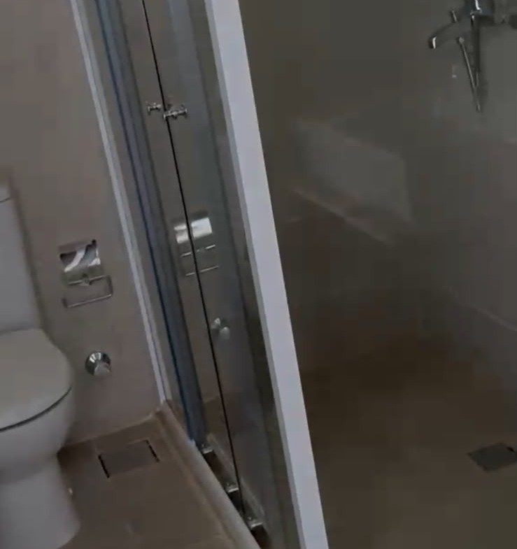 Bathroom with glass shower and toilet - apartment in Fifth Square, New Cairo