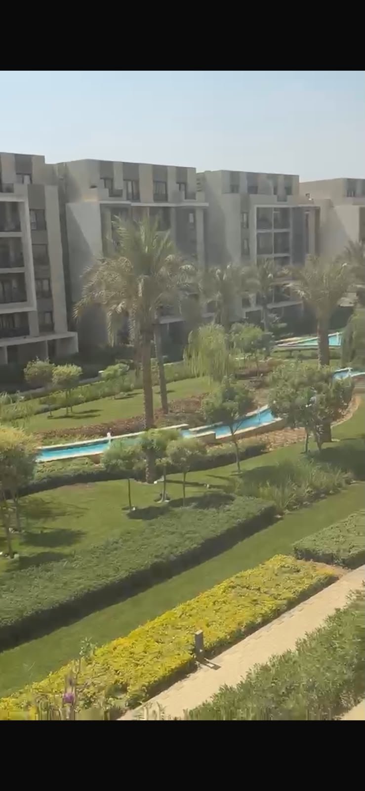 5th-square-apartment-for-rent-461-05 Gardens and buildings seen from the balcony - apartment in Fifth Square, New Cairo
