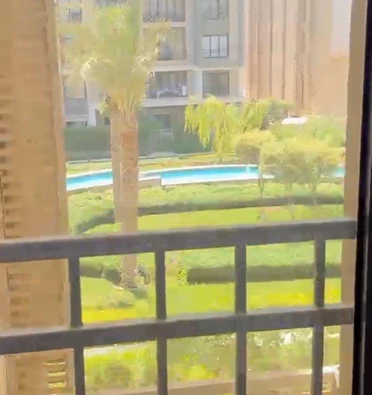 Balcony railing and garden view - apartment in Fifth Square, New Cairo