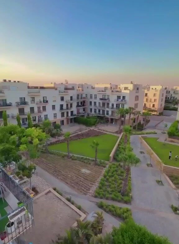 Residential buildings and landscaped courtyard view, Beverly Hills, Sheikh Zayed, studio for rent | فيو المباني السكنية والحديقة المشتركة، بيفرلي هيلز، الشيخ زايد، استوديو للإيجار
