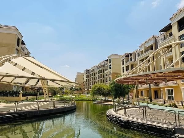Sarai landscaped water feature between apartment buildings | مسطح مائي ولاندسكيب بين عمارات سراي