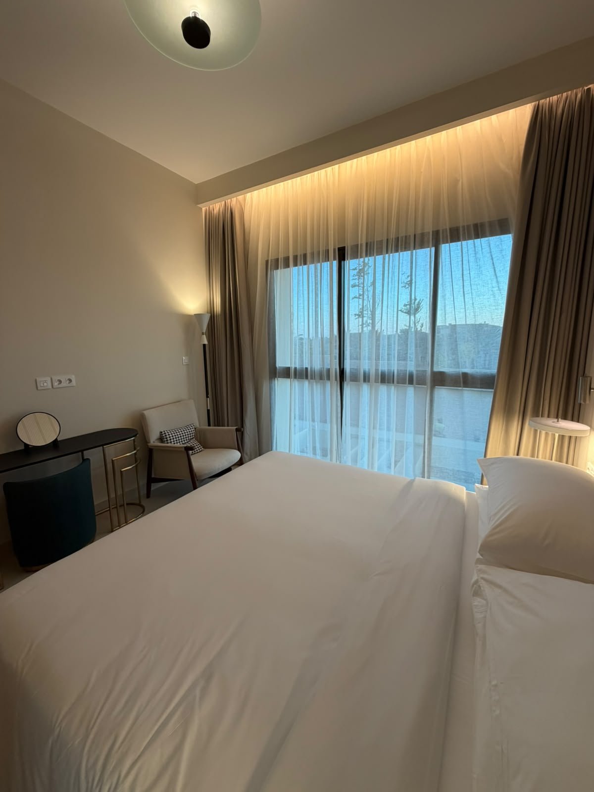 68-marassi-alamein-residence-307-04 Bedroom and balcony doors, hotel apartment for rent in Marassi Alamein Residence, North Coast | غرفة النوم وأبواب البلكونة، شقة فندقية للإيجار في مراسي العلمين ريزيدنس، الساحل الشمالي