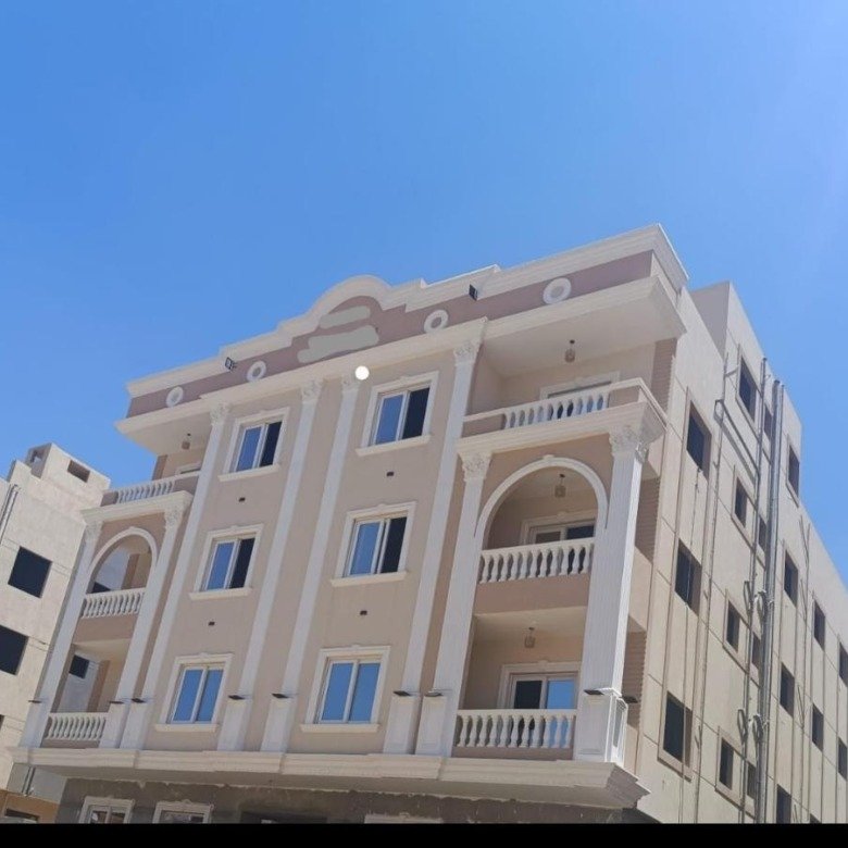Front and side exterior of the penthouse building, Bayt Al Watan District 2, Fifth Settlement, penthouse for sale | الواجهة الأمامية والجانبية لمبنى البنتهاوس، بيت الوطن الحي الثاني، التجمع الخامس، بنتهاوس للبيع
