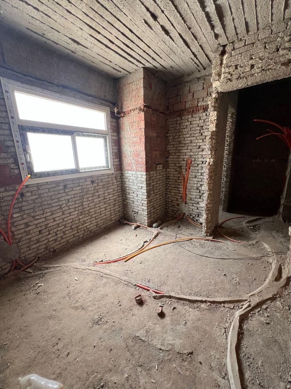 Unfinished room with corner windows in Promenade, Fifth Settlement, New Cairo, apartment for sale | غرفة بدون تشطيب بنوافذ على ناصية في برومناد التجمع الخامس، شقة للبيع
