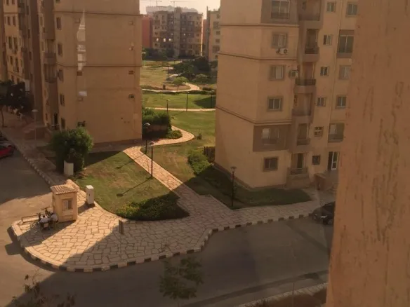 Landscape garden view from Madinaty apartment - إطلالة لاندسكيب جاردن من شقة في مدينتي - apartment for sale in Madinaty