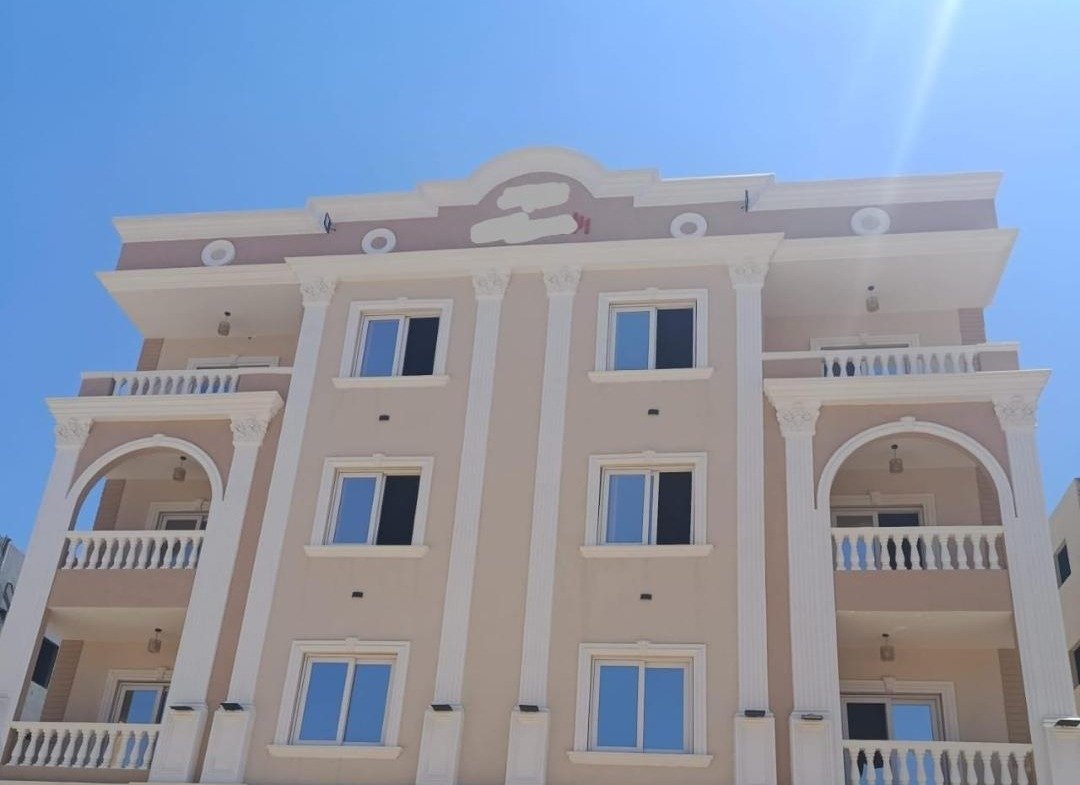 Front facade and balconies of the penthouse building, Bayt Al Watan District 2, Fifth Settlement, penthouse for sale | الواجهة الأمامية وتراسات مبنى البنتهاوس، بيت الوطن الحي الثاني، التجمع الخامس، بنتهاوس للبيع