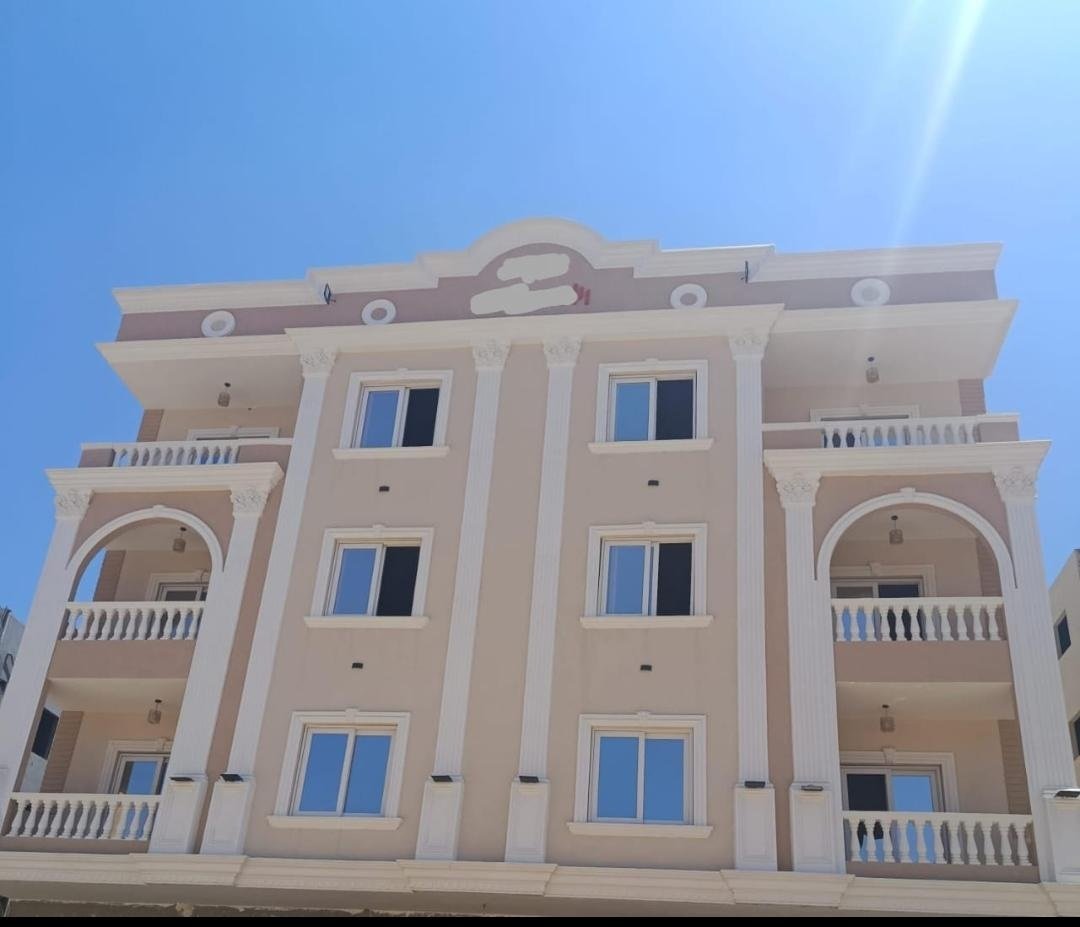 8-bayt-al-watan-penthouse-263-01 Front facade and balconies of the penthouse building, Bayt Al Watan District 2, Fifth Settlement, penthouse for sale | الواجهة الأمامية وتراسات مبنى البنتهاوس، بيت الوطن الحي الثاني، التجمع الخامس، بنتهاوس للبيع