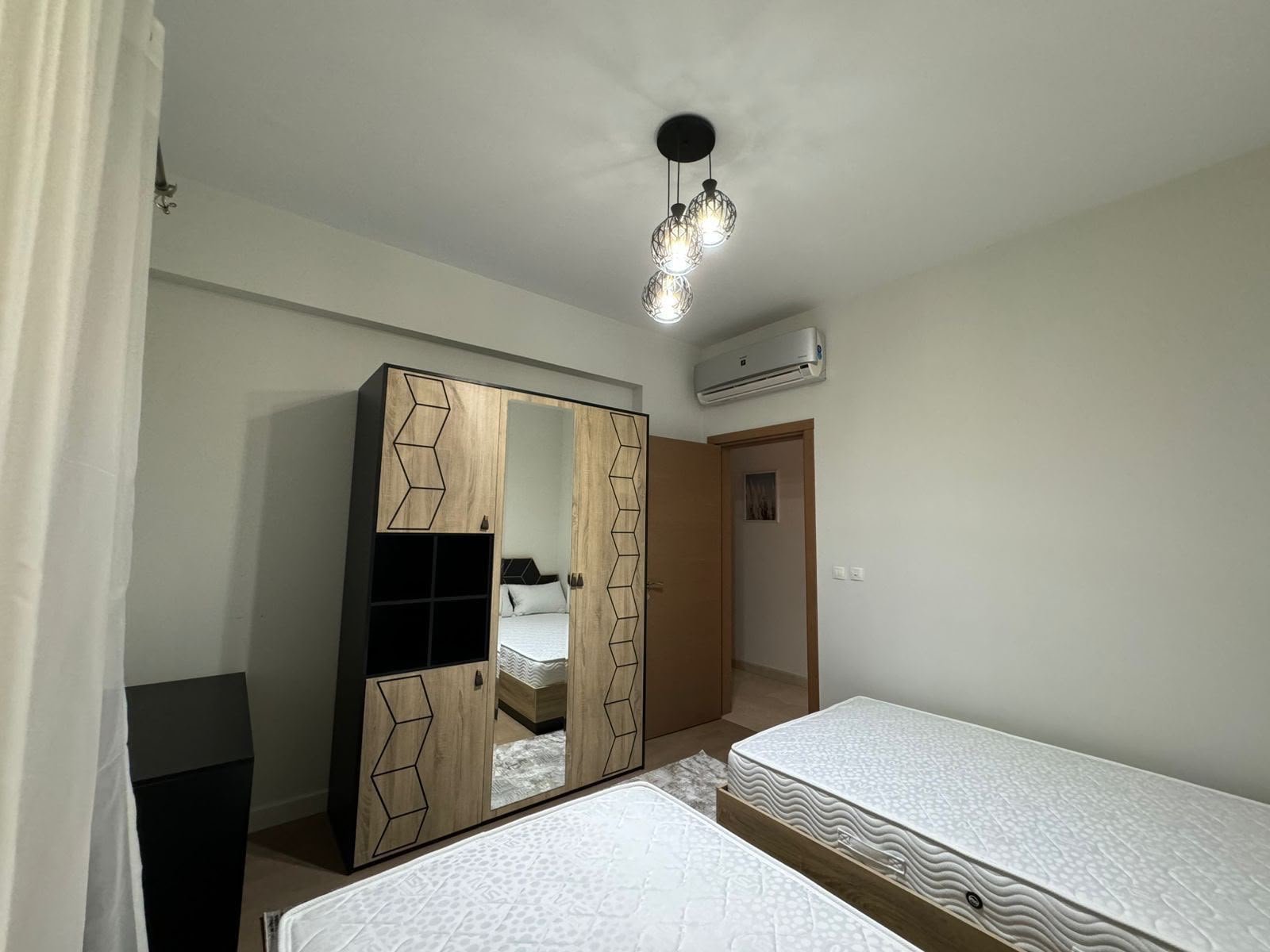 8-mivida-boulevard-apartment-rent-327-07 Bedroom wardrobe and television, apartment for rent in Mivida Boulevard, New Cairo | خزانة وتلفزيون غرفة النوم، شقة للإيجار في ميفيدا البوليفارد، القاهرة الجديدة