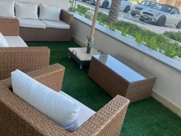 Furnished covered terrace with outdoor view, Marassi Faya chalet, North Coast - تراس مغطى مفروش بإطلالة خارجية، شاليه مراسي فايا، الساحل الشمالي