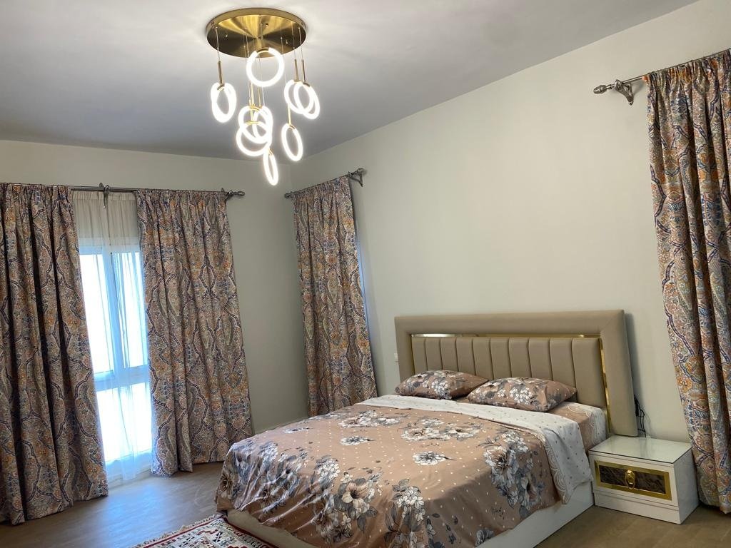 Double bedroom, Mivida Boulevard furnished apartment for rent | غرفة نوم مزدوجة، شقة مفروشة للإيجار في ميفيدا بوليفارد