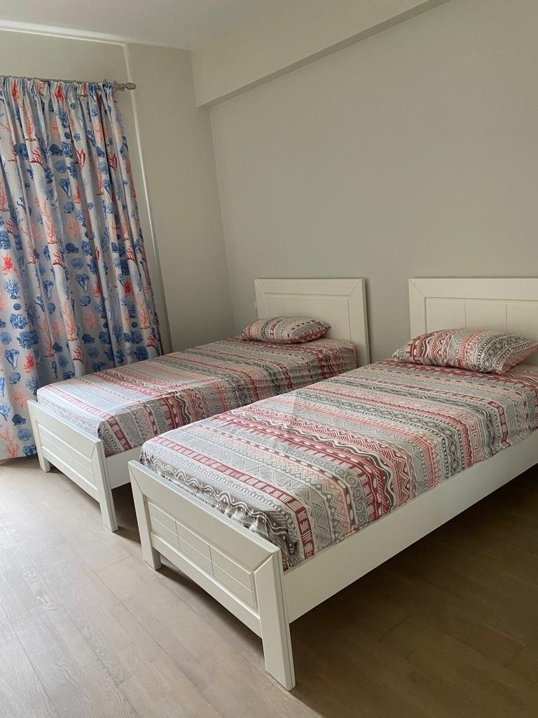 93-mivida-boulevard-apartment-rent-449-04 Twin bedroom, Mivida Boulevard furnished apartment for rent | غرفة بسريرين، شقة مفروشة للإيجار في ميفيدا بوليفارد