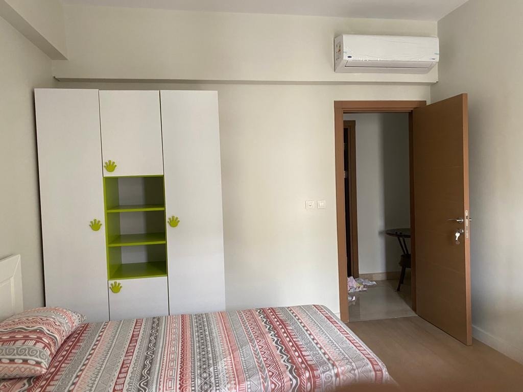 Bedroom with air conditioning, Mivida Boulevard furnished apartment for rent | غرفة نوم بتكييف، شقة مفروشة للإيجار في ميفيدا بوليفارد