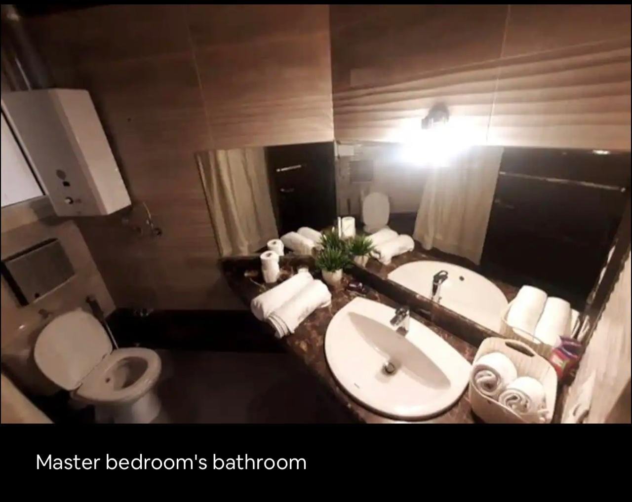 akoya-513-25 Bathroom with a double basin counter and a toilet - apartment in Akoya, New Cairo