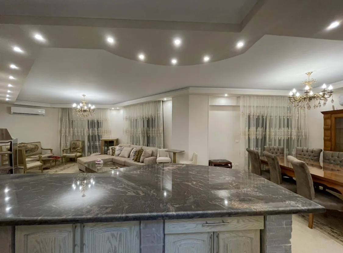 akoya-513-4 Granite counter in front of the dining and reception areas - apartment in Akoya, New Cairo