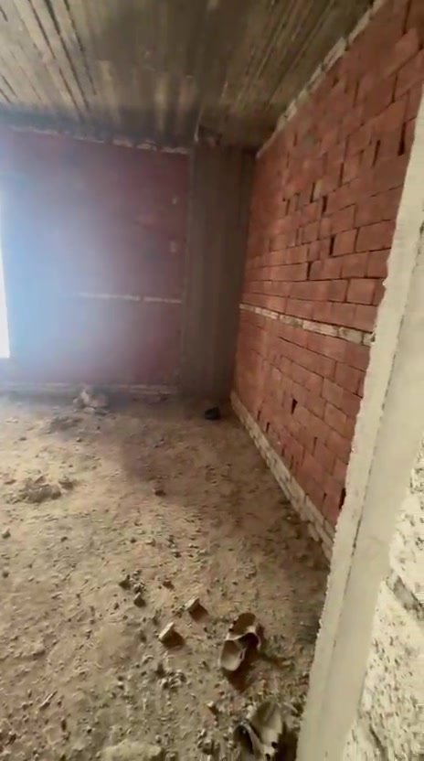 al-nakheel-apt-120-10 ركن غرفة عارية بحوائط طوب وأرضية ترابية - شقة في كمبوند النخيل التجمع الخامس، القاهرة الجديدة