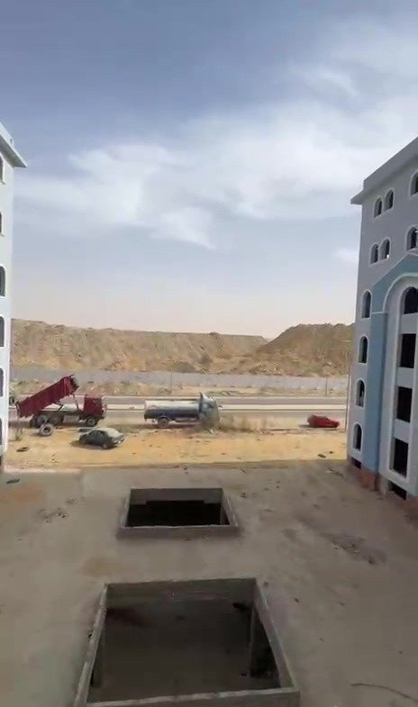 فناء داخلي ومباني مجاورة تحت سماء غائمة - شقة في كمبوند النخيل التجمع الخامس، القاهرة الجديدة