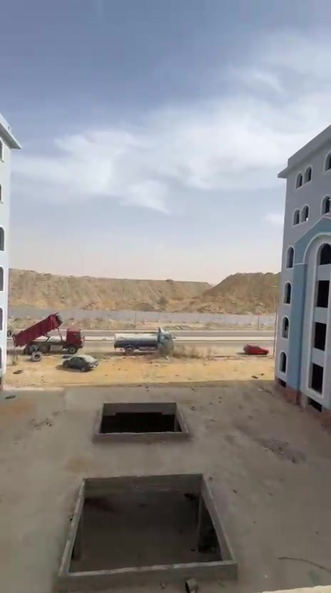 al-nakheel-apt-120-2 فناء داخلي ومباني مجاورة تحت سماء غائمة - شقة في كمبوند النخيل التجمع الخامس، القاهرة الجديدة