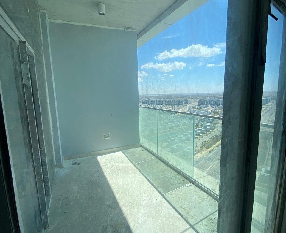 Narrow glass-enclosed balcony with a sea view - chalet in Alamein Towers