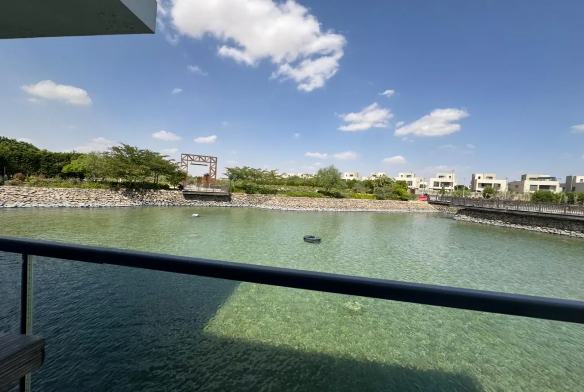 Lagoon view with a fountain from a balcony - apartment in Alburouj, Shorouk City