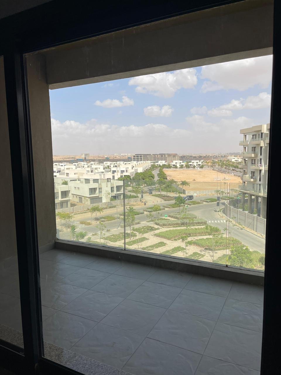 Window view of a green open landscape - apartment in Alburouj, Shorouk City