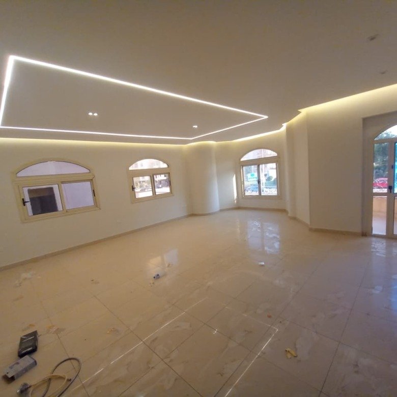 Wide office ready reception with LED ceiling and glossy tiles, apartment for administrative rent in Al Narges 4