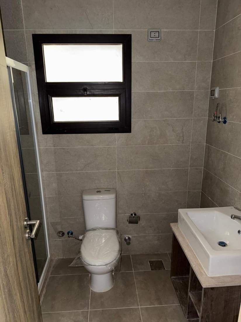 apartment-for-sale-5th-square-moon-residence-new-cairo-135-sqm-330-guest-bathroom حمام بمرحاض وحوض - شقة في فيفث سكوير، القاهرة الجديدة