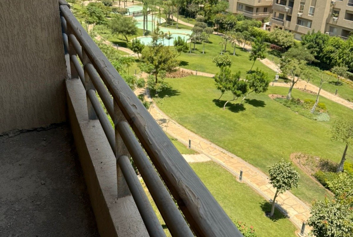 Balcony railing overlooking the gardens - apartment in Fifth Square, New Cairo