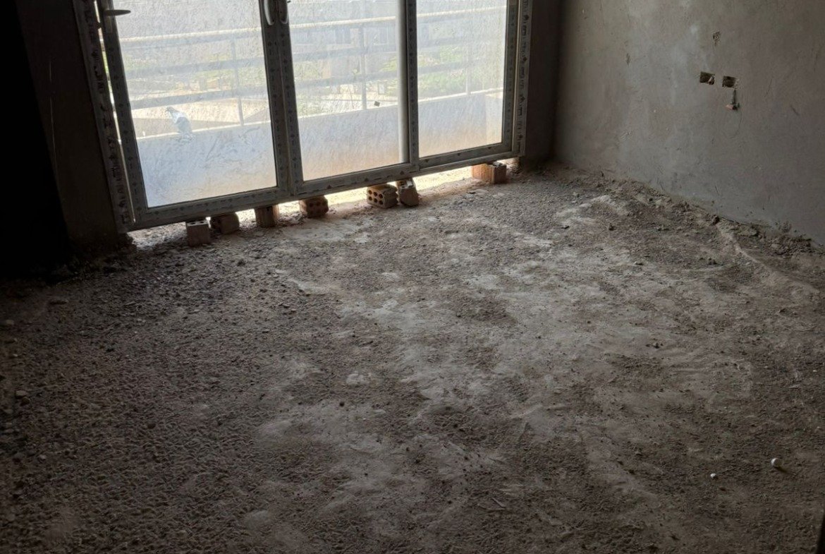 Unfinished room with large windows - apartment in Fifth Square, New Cairo