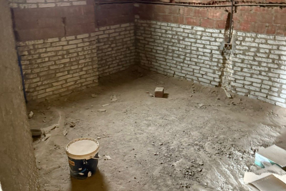 Unfinished room with brick wall and window - apartment in Fifth Square, New Cairo