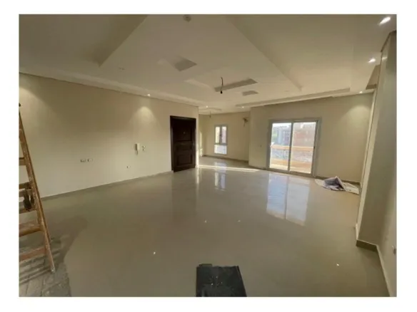 Wide reception with gypsum ceiling and glossy tiles, apartment for sale in Al Banafseg 6
