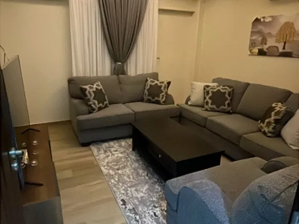 Furnished reception with corner sofa and gypsum ceiling, apartment for sale in Eazy Life New Cairo - شقة للبيع في ايزي لايف القاهرة الجديدة 191-01