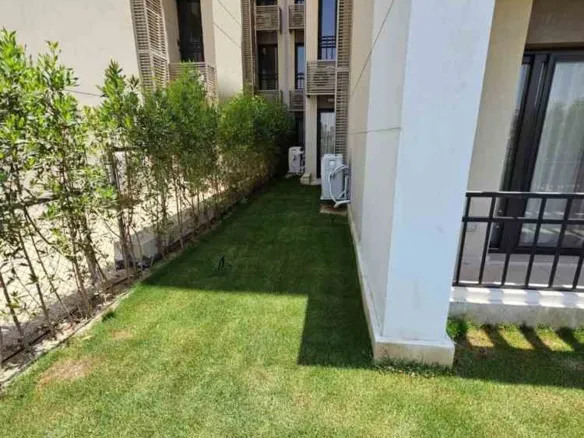 Private garden of ground floor apartment for rent in Moon Residences 5th Square New Cairo - شقة للبيع في فيفث سكوير التجمع الخامس القاهرة الجديدة 398-01