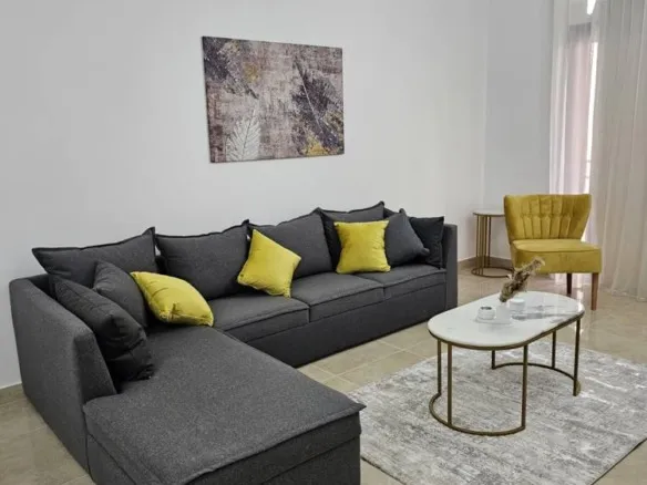 Furnished living room of apartment for rent in Moon Residences 5th Square New Cairo - شقة للبيع في فيفث سكوير التجمع الخامس القاهرة الجديدة 44032-01