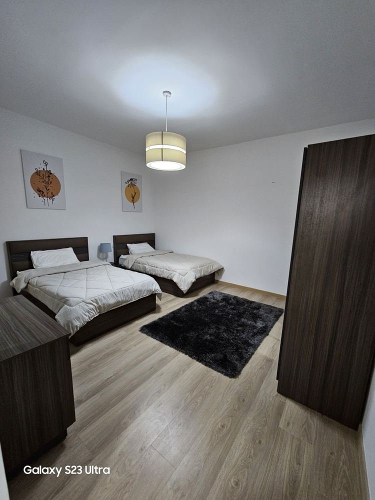 apartment-moon-residences-5th-square-new-cairo-167-sqm-397-twin-bedroom غرفة نوم بسريرين مفردين - شقة في مون ريزيدنس فيفث سكوير، القاهرة الجديدة
