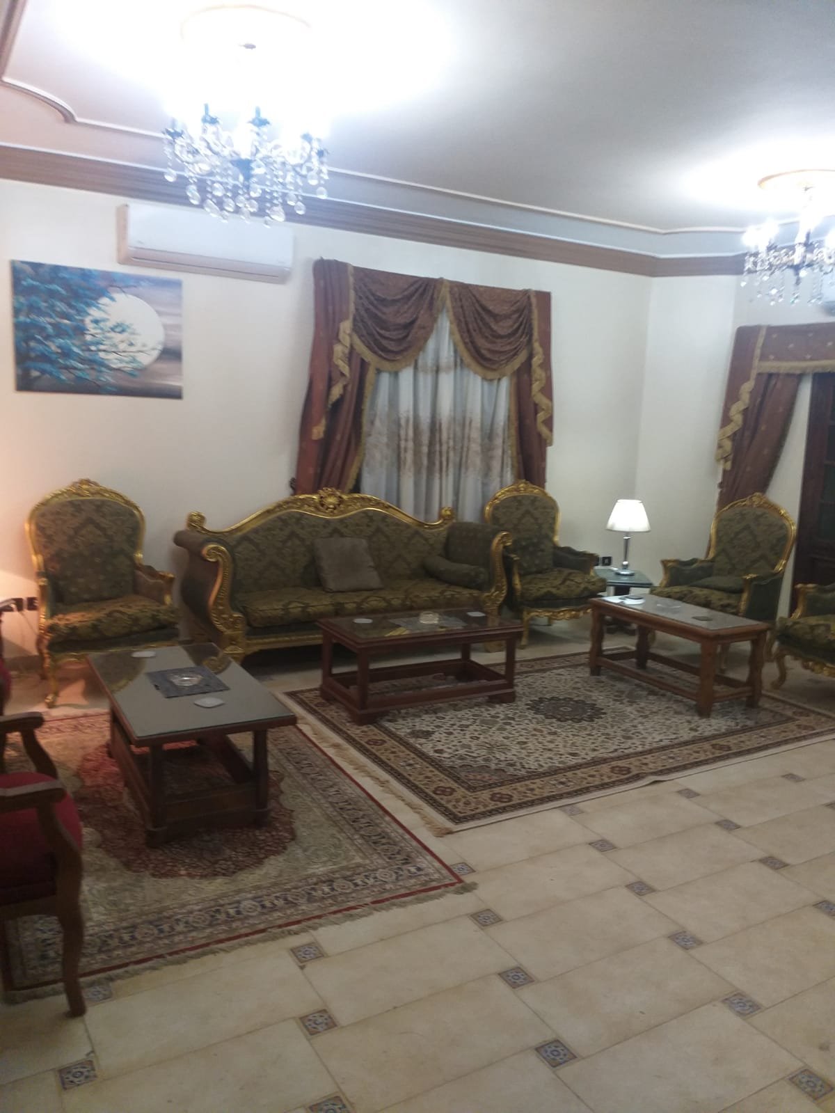 Classic sitting room with a patterned tile floor - apartment in Yasmeen 3, New Cairo