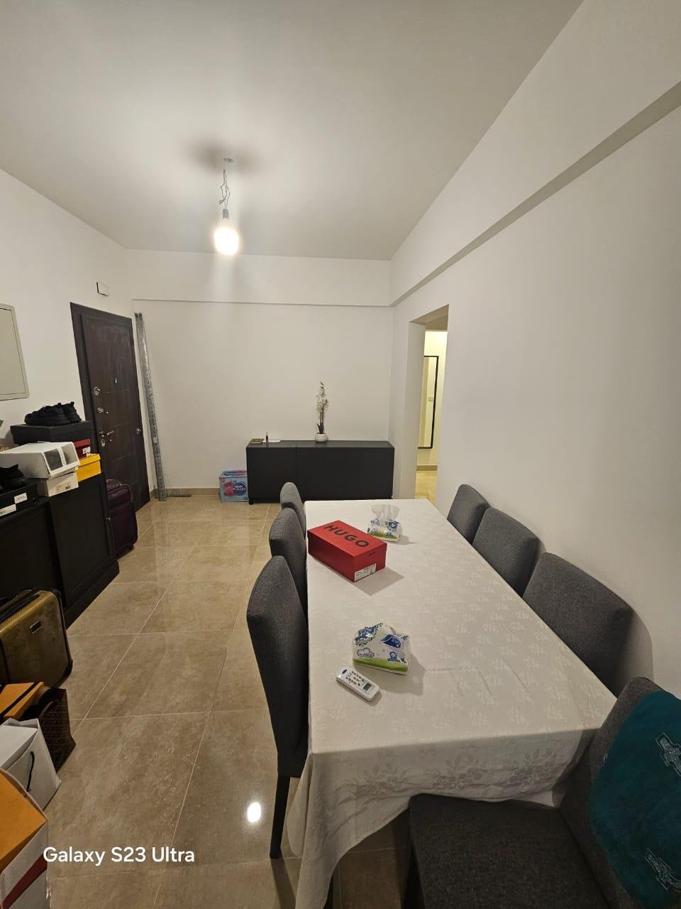 apartment-sale-5th-square-new-cairo-15-dining-area ركن طعام بطاولة طويلة - شقة في فيفث سكوير، القاهرة الجديدة