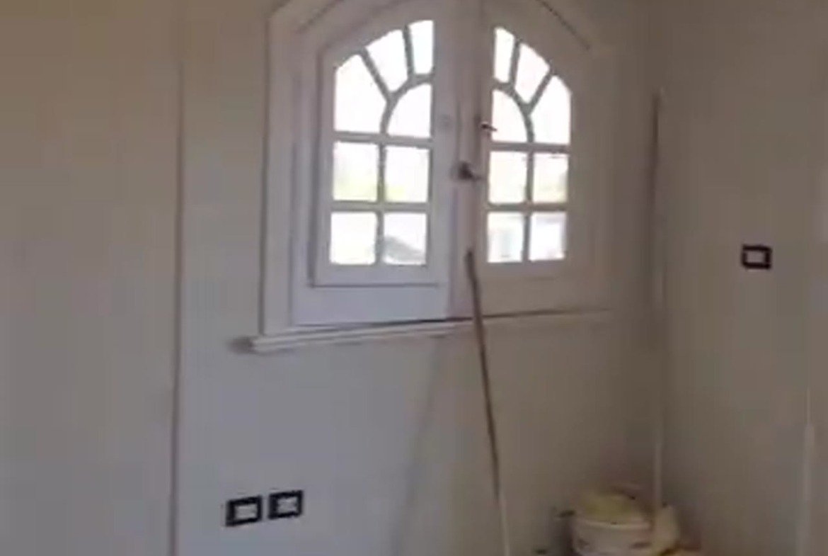 Empty room with an arched white window - apartment in Al Banafseg New Cairo – 3 Bedrooms 220 sqm Mohamed Naguib St, New Cairo