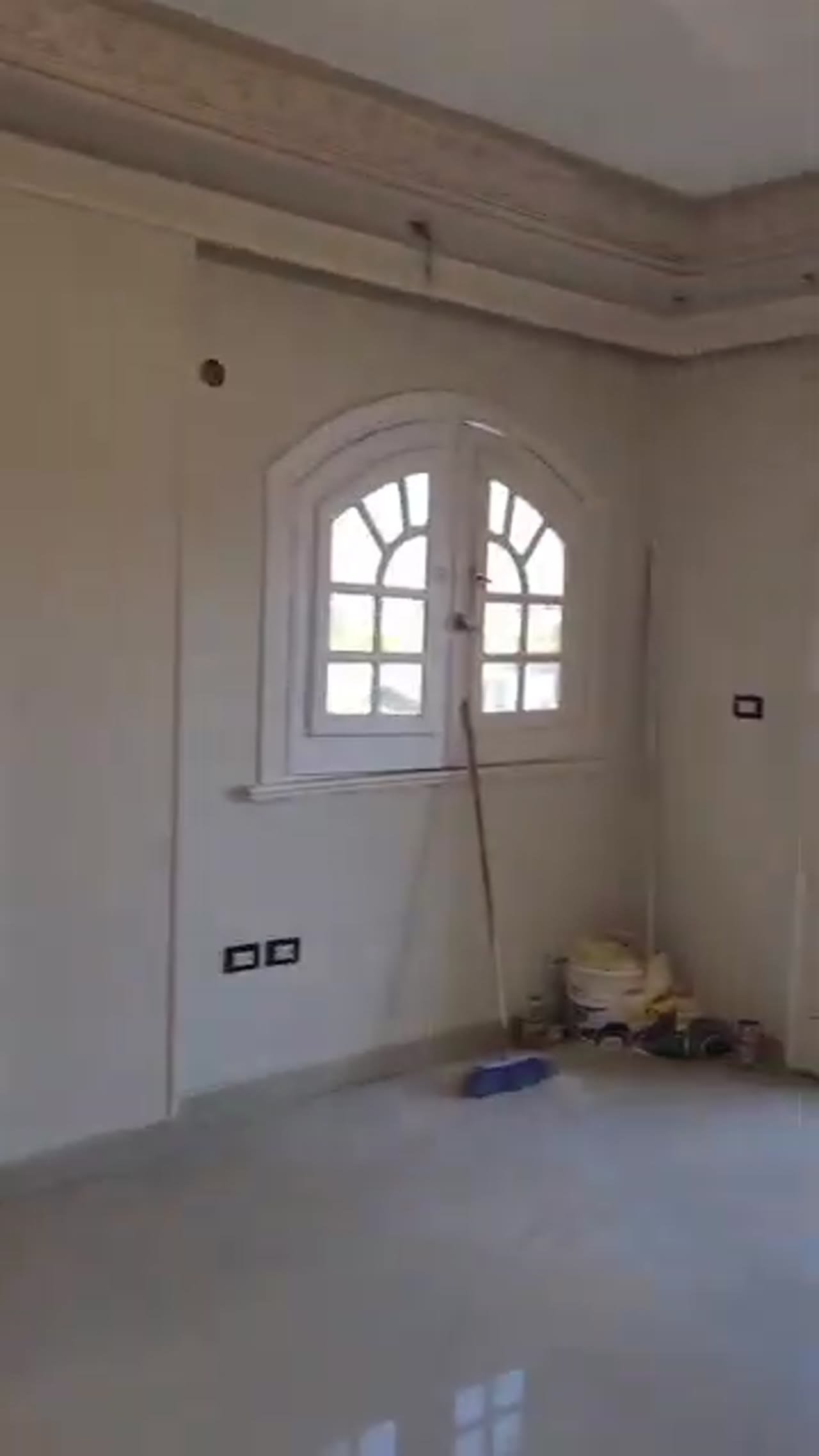 Empty room with an arched white window - apartment in Al Banafseg New Cairo – 3 Bedrooms 220 sqm Mohamed Naguib St, New Cairo