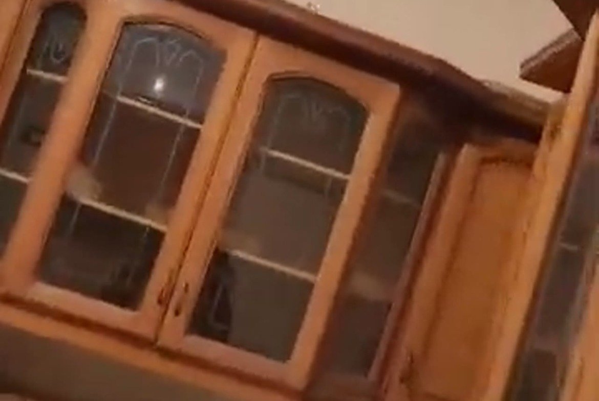 Wooden display cabinet with glass doors - apartment in Al Banafseg New Cairo – 3 Bedrooms 220 sqm Mohamed Naguib St, New Cairo